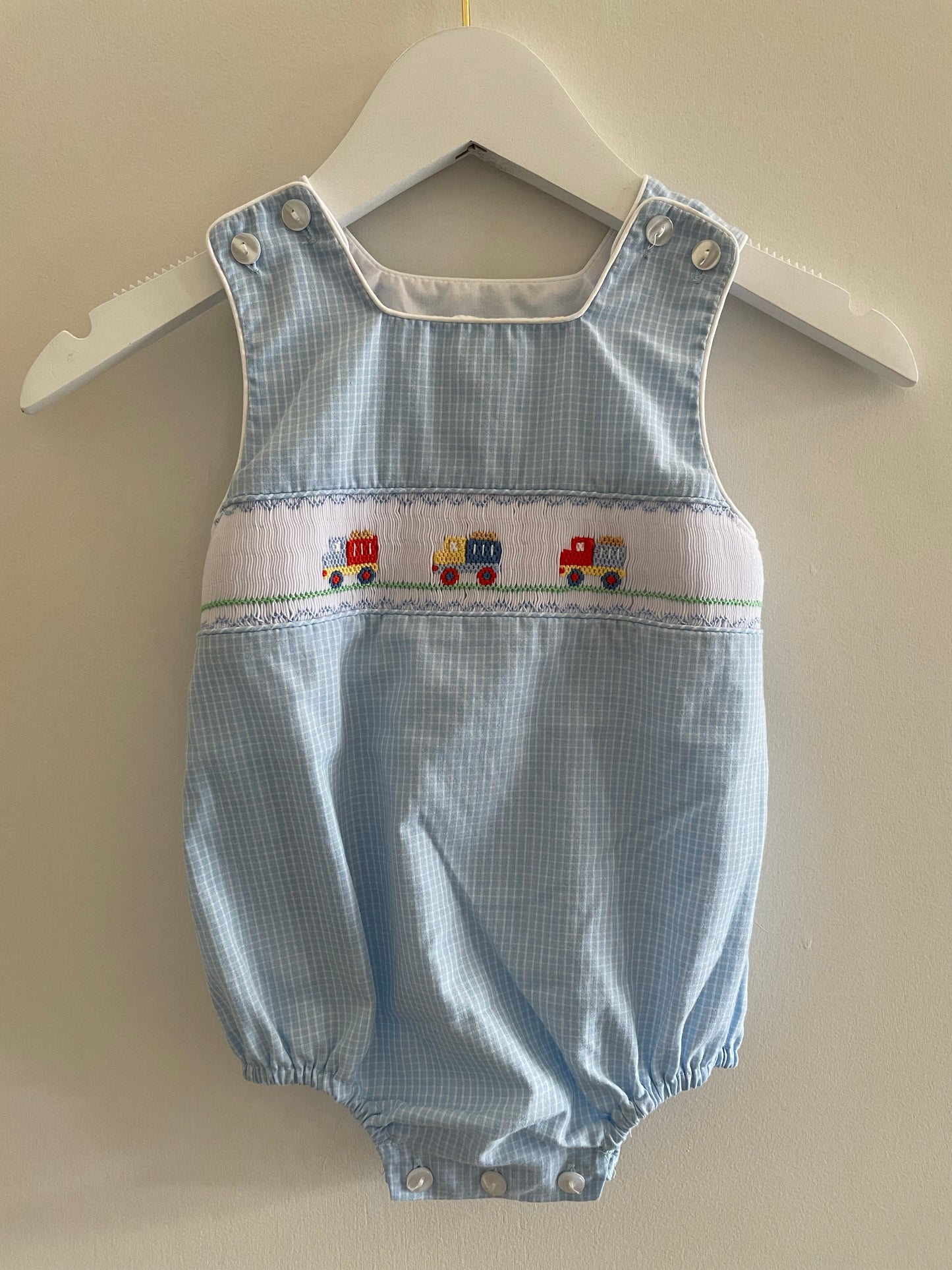 Petit Bebe blue truck smocked bubble 12mo